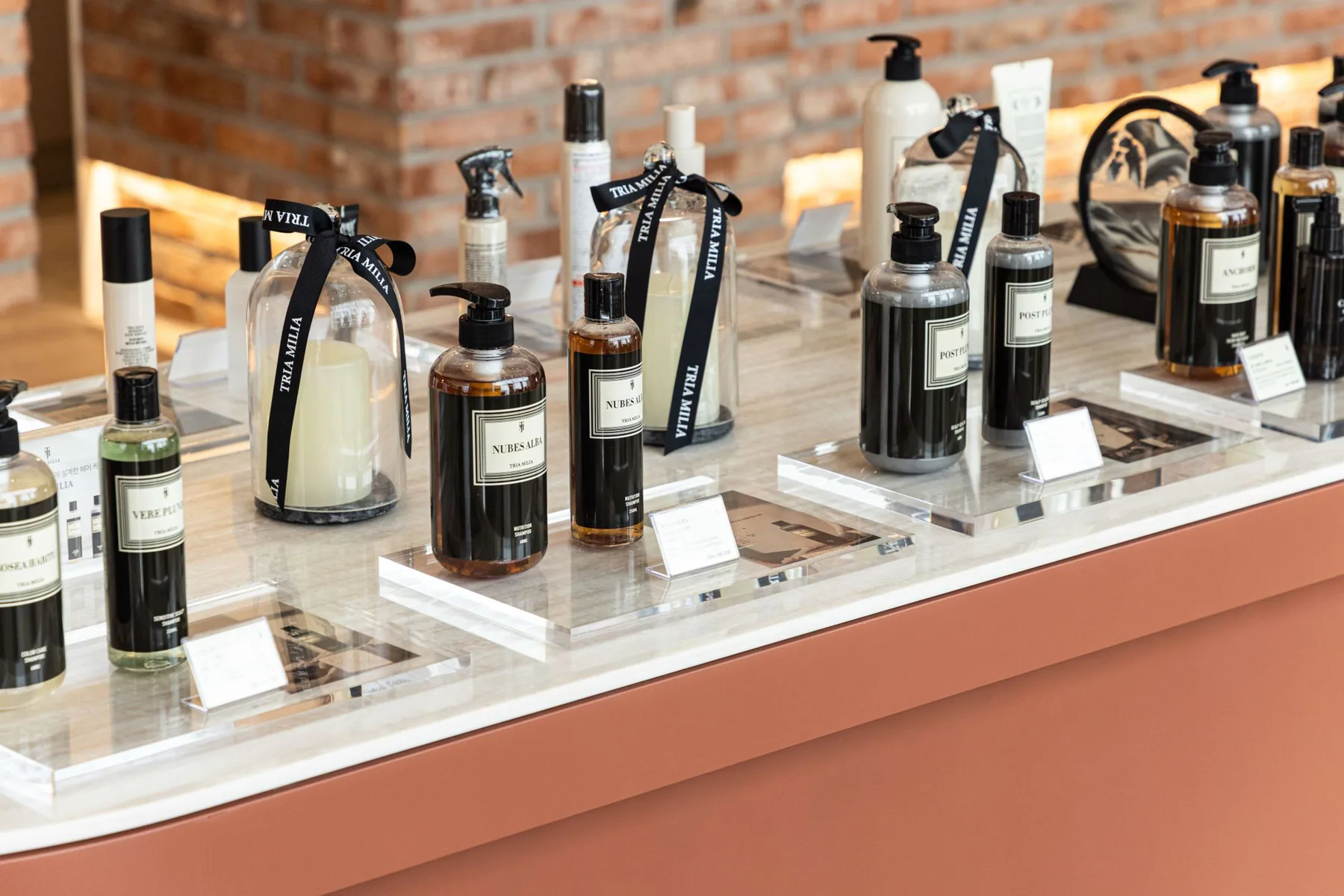 Hair products on a terracotta display